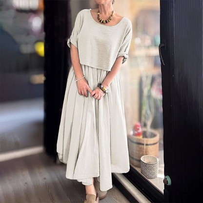 👗Women's Round Neck Loose Top and Long Skirt Set